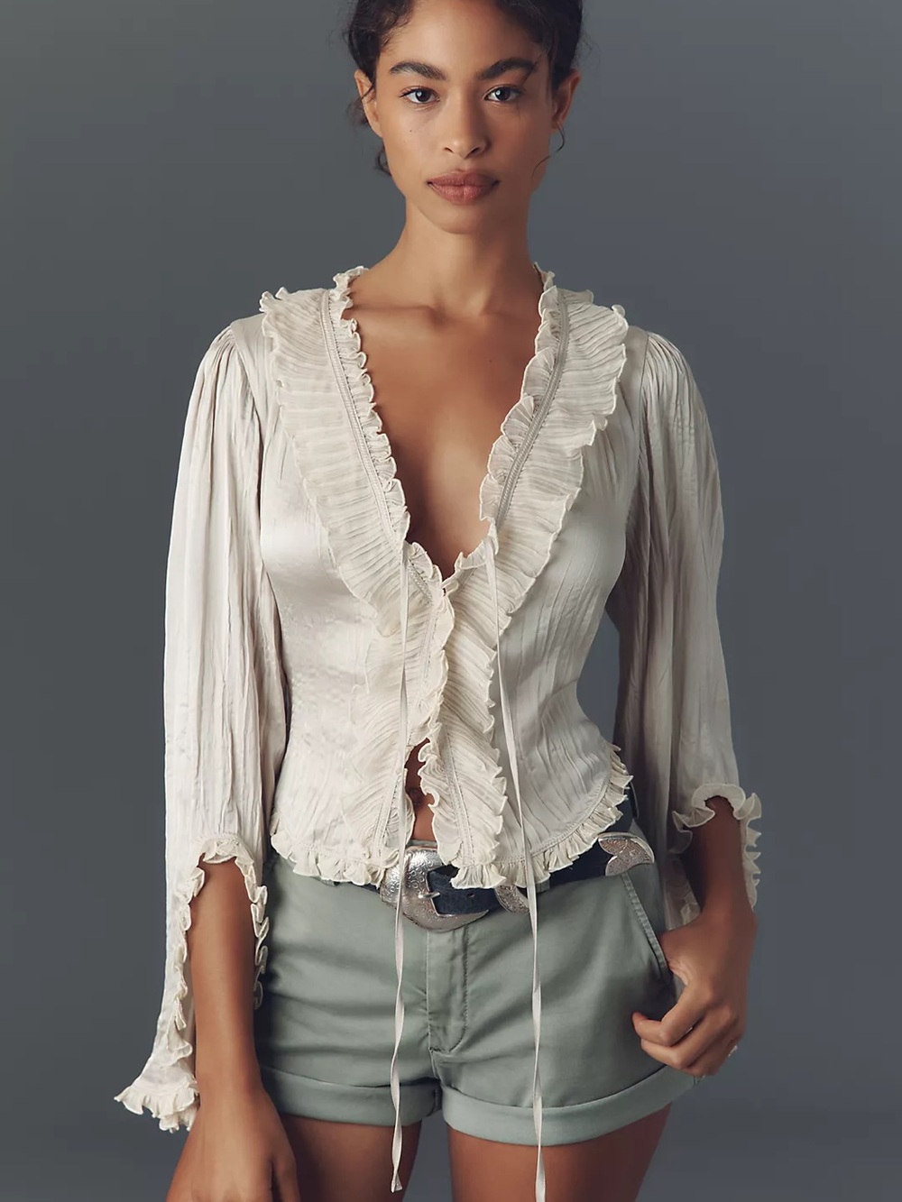 Anthropologie Cream long sleeve ruffled tie front top